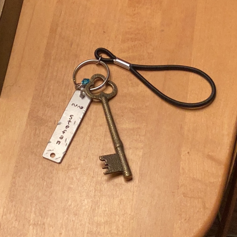Stefan keychain band brass key door puller blue gem slight stretch new